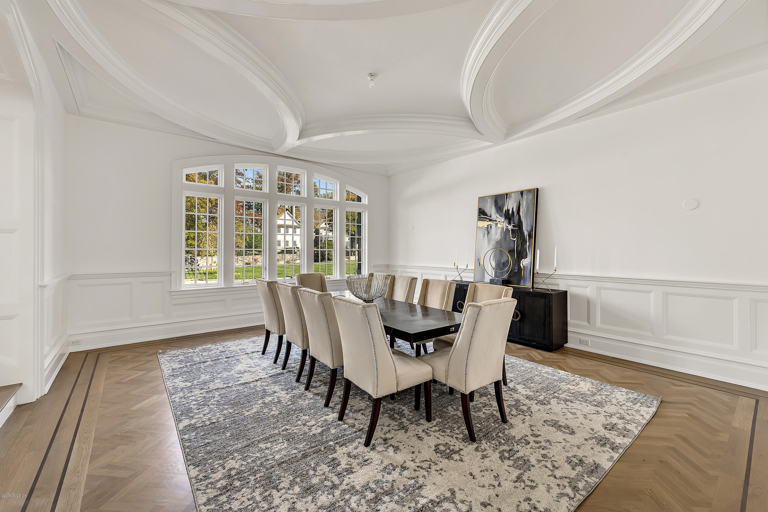 7 Loch Lane Greenwich, CT 06830 - Photo 10 of 41 a view of a dining room with furniture window and wooden floor