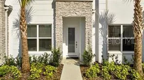 front view of a house with a small yard