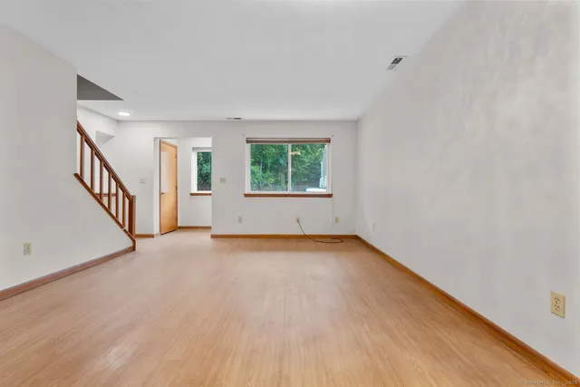 an empty room with windows