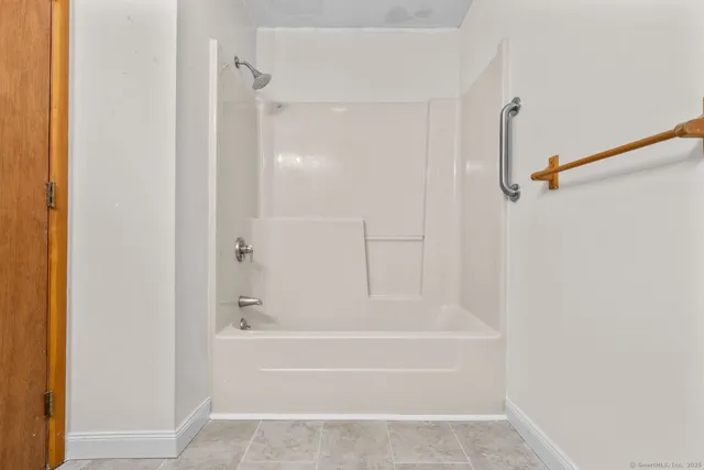 a bathroom with a bathtub