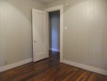 2518 23rd Street Lubbock, TX 79410 - Photo 3 of 9 a view of an empty room with wooden floor