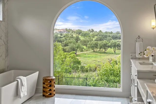 a view of a room with a large window