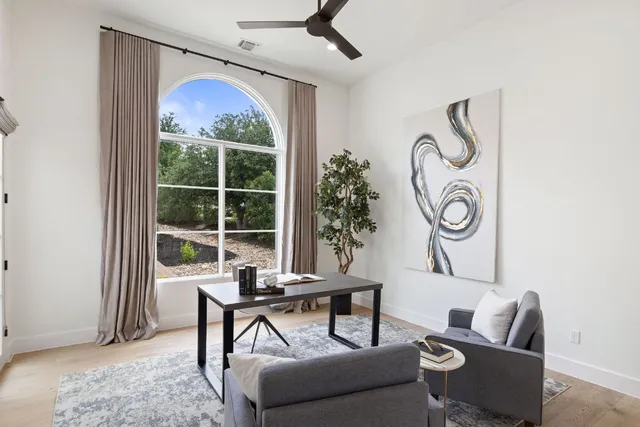 a view of a room with a large window