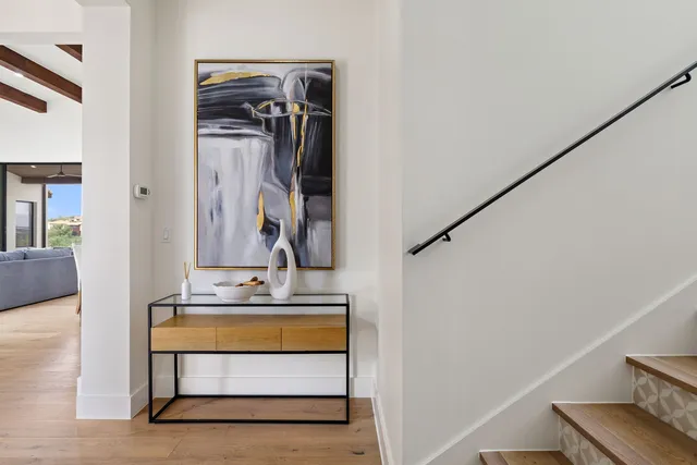 a bathroom with a sink a mirror and vanity