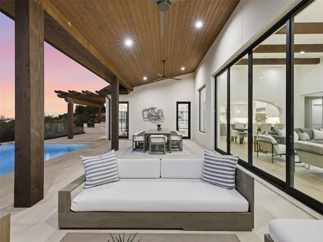 a view of an outdoor dining space with furniture