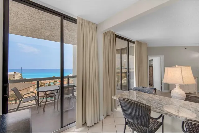 a living room with furniture and a gate