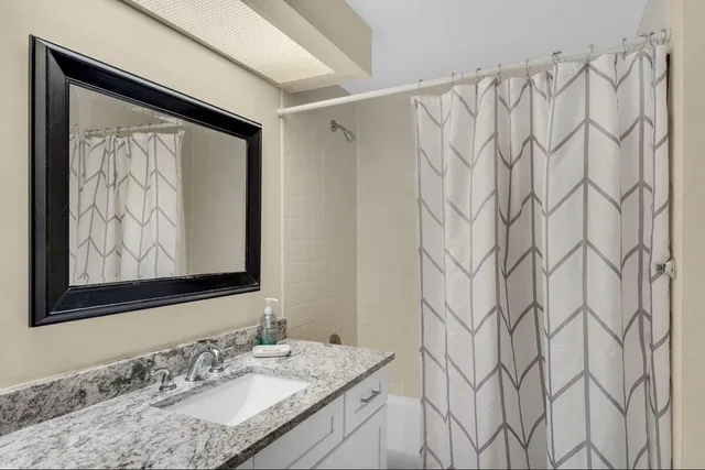 a view of a chairs and table in patio