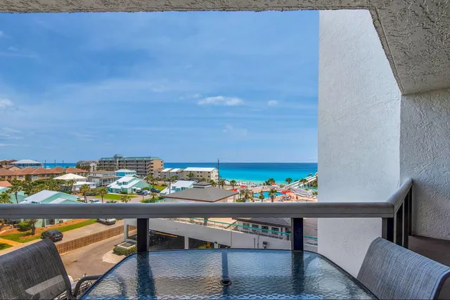 a view of a chairs and table on the terrace