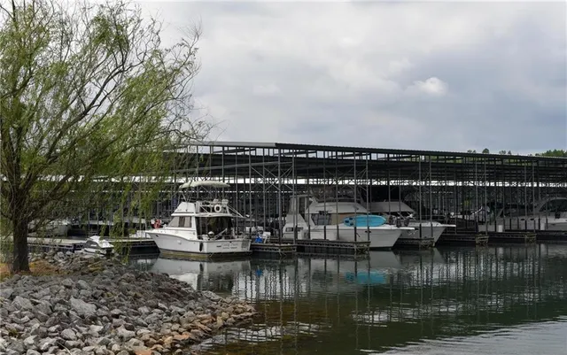 a view of a lake yard and mountain