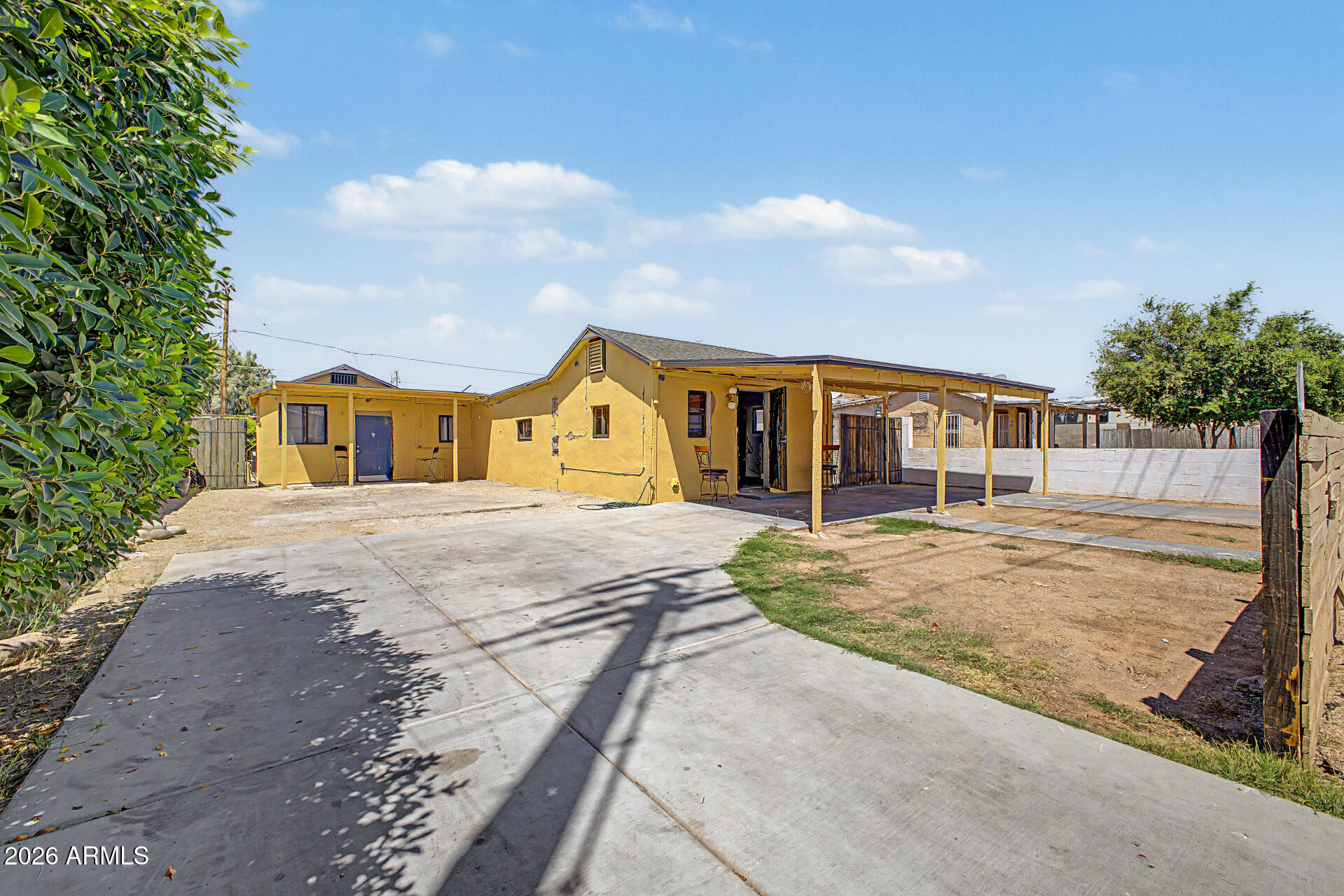 1612 South 5th Street Phoenix, AZ 85004 - Photo 3 of 27 a front view of a house with a yard