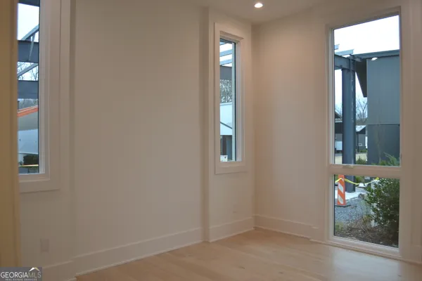 an empty room with windows