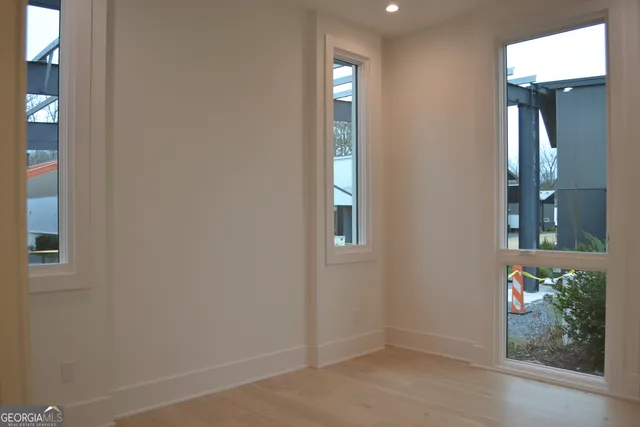 an empty room with windows