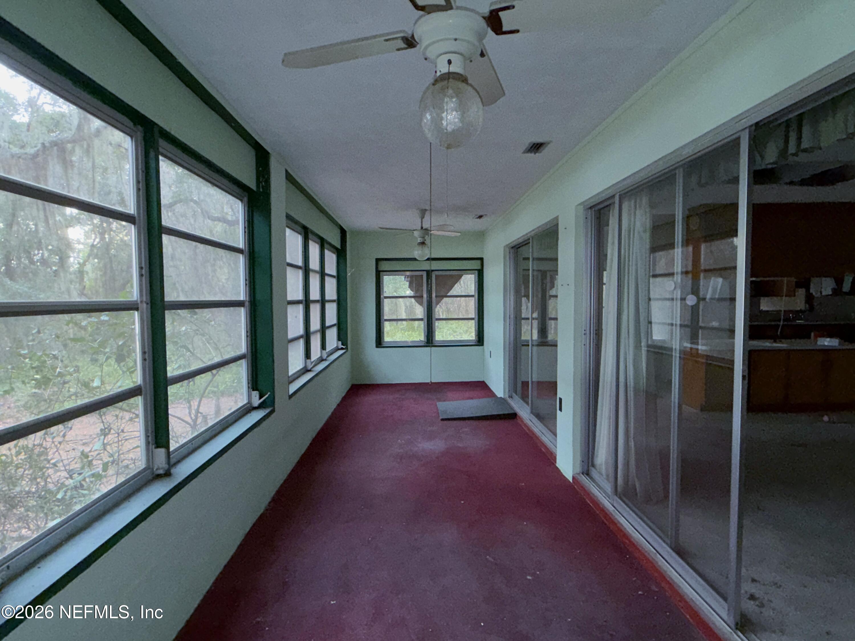 5943 White Sands Road Keystone Heights, FL 32656 - Photo 17 of 18 a view of gallery with windows