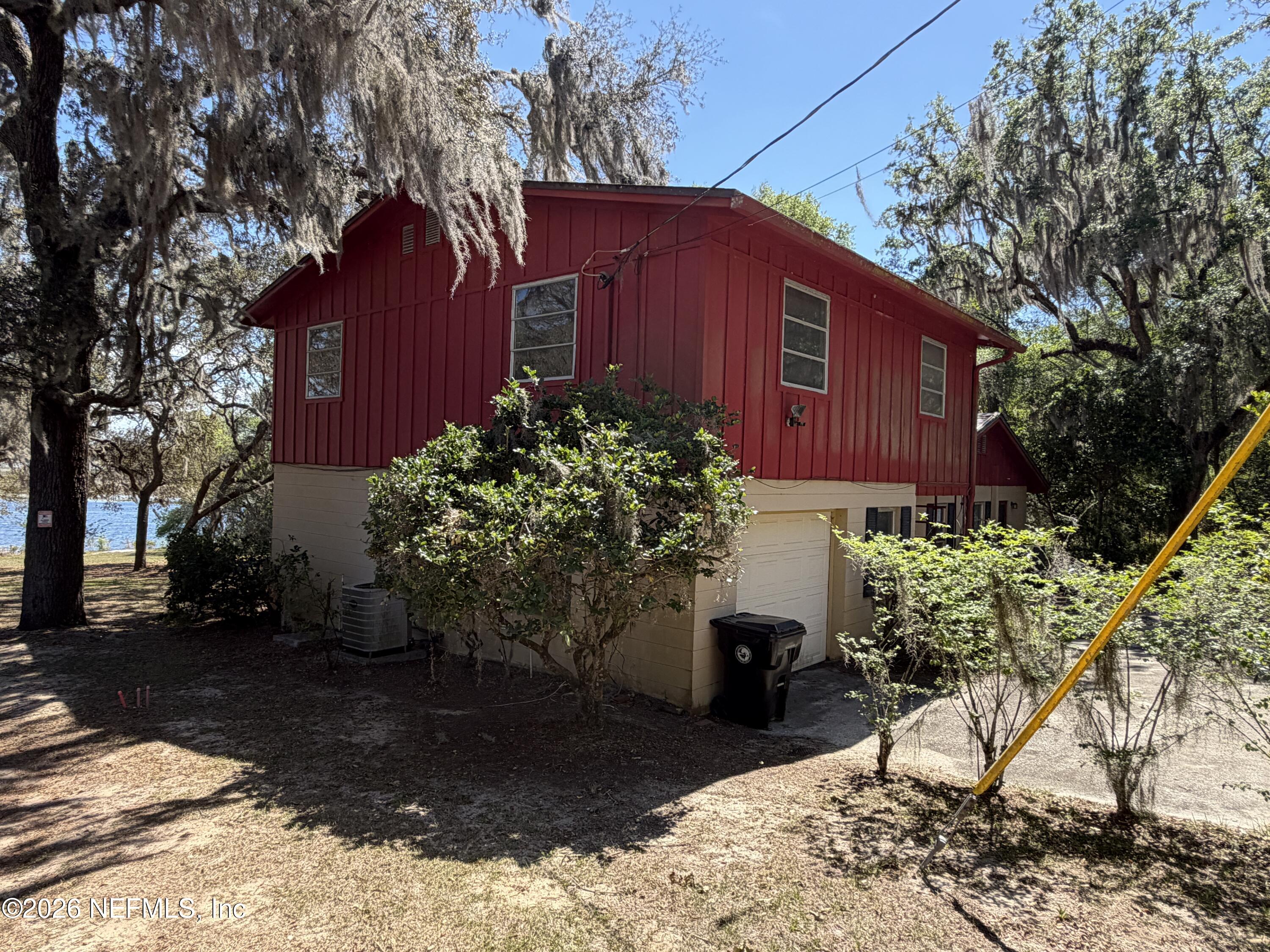 5943 White Sands Road Keystone Heights, FL 32656 - Photo 3 of 18 a view of a house with a yard