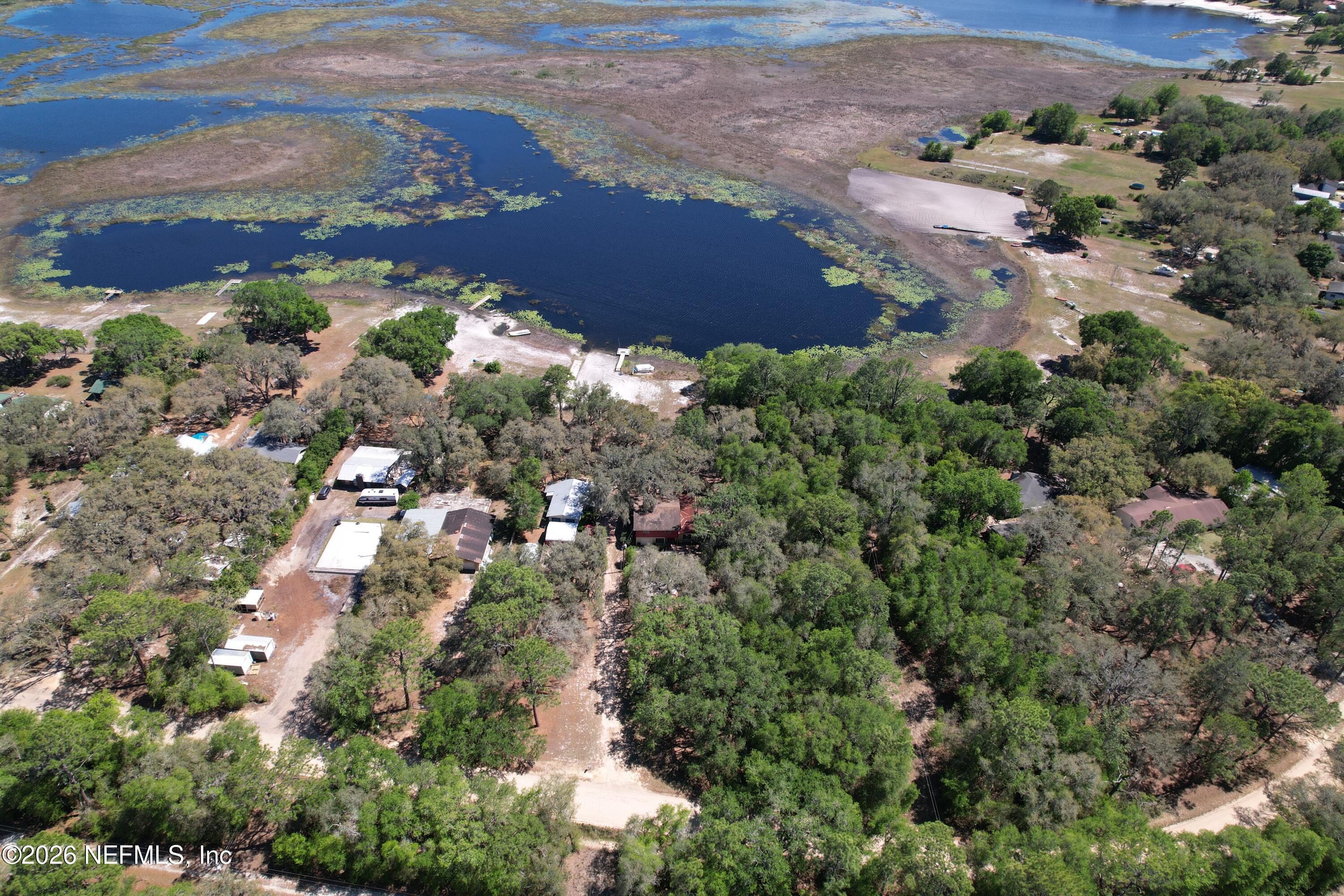 5943 White Sands Road Keystone Heights, FL 32656 - Photo 5 of 18 an aerial view of residential houses with outdoor space