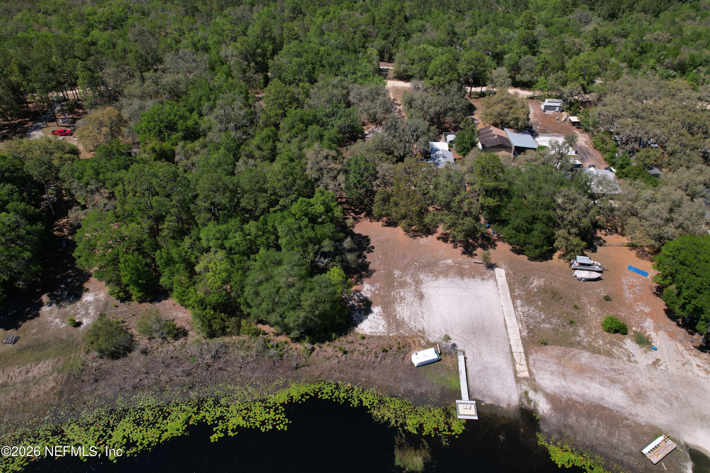 5943 White Sands Road Keystone Heights, FL 32656 - Photo 6 of 18 an aerial view of a house with a yard