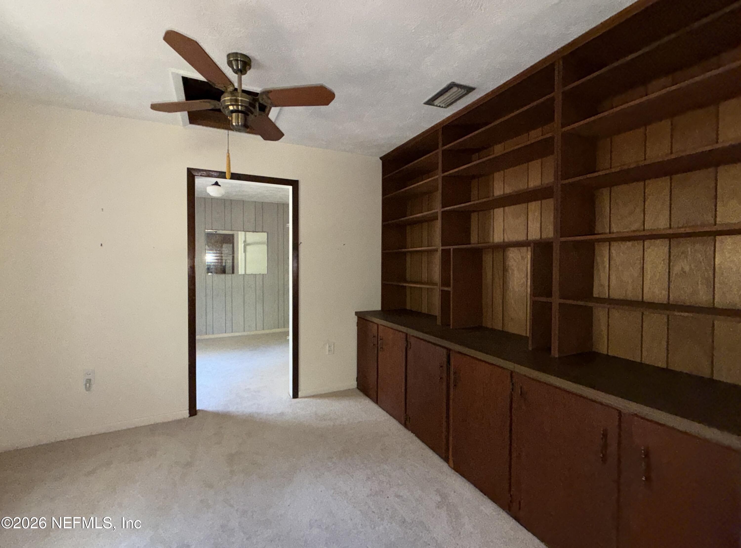5943 White Sands Road Keystone Heights, FL 32656 - Photo 7 of 18 a view of an empty room
