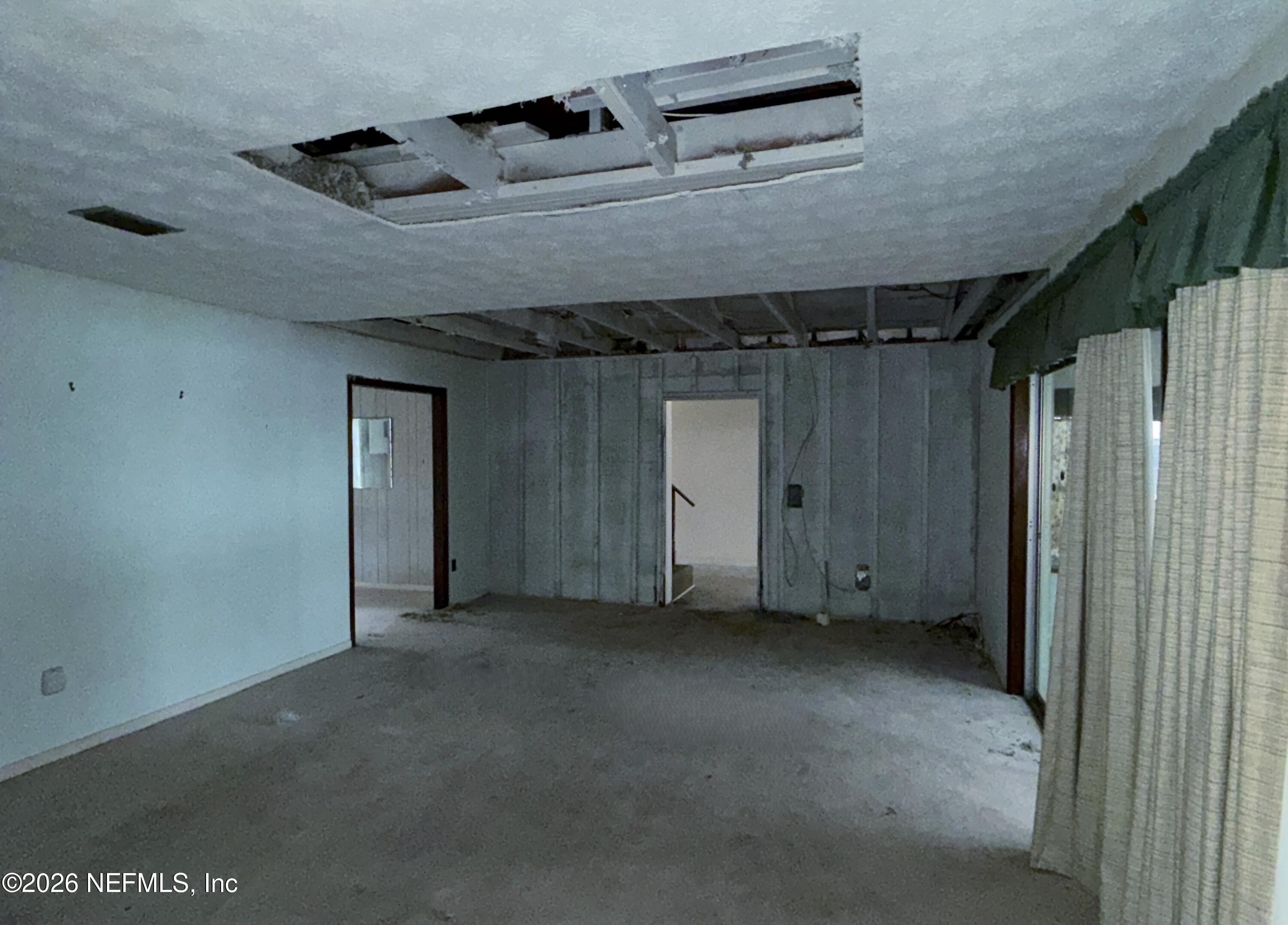 5943 White Sands Road Keystone Heights, FL 32656 - Photo 9 of 18 a view of an empty room