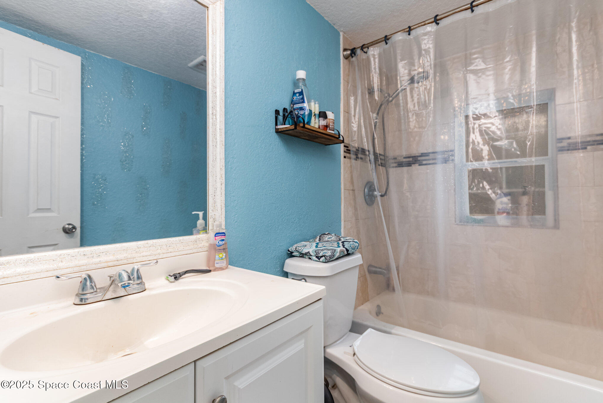 2004 High Street Leesburg, FL 34748 - Photo 20 of 30 a bathroom with a sink toilet and shower