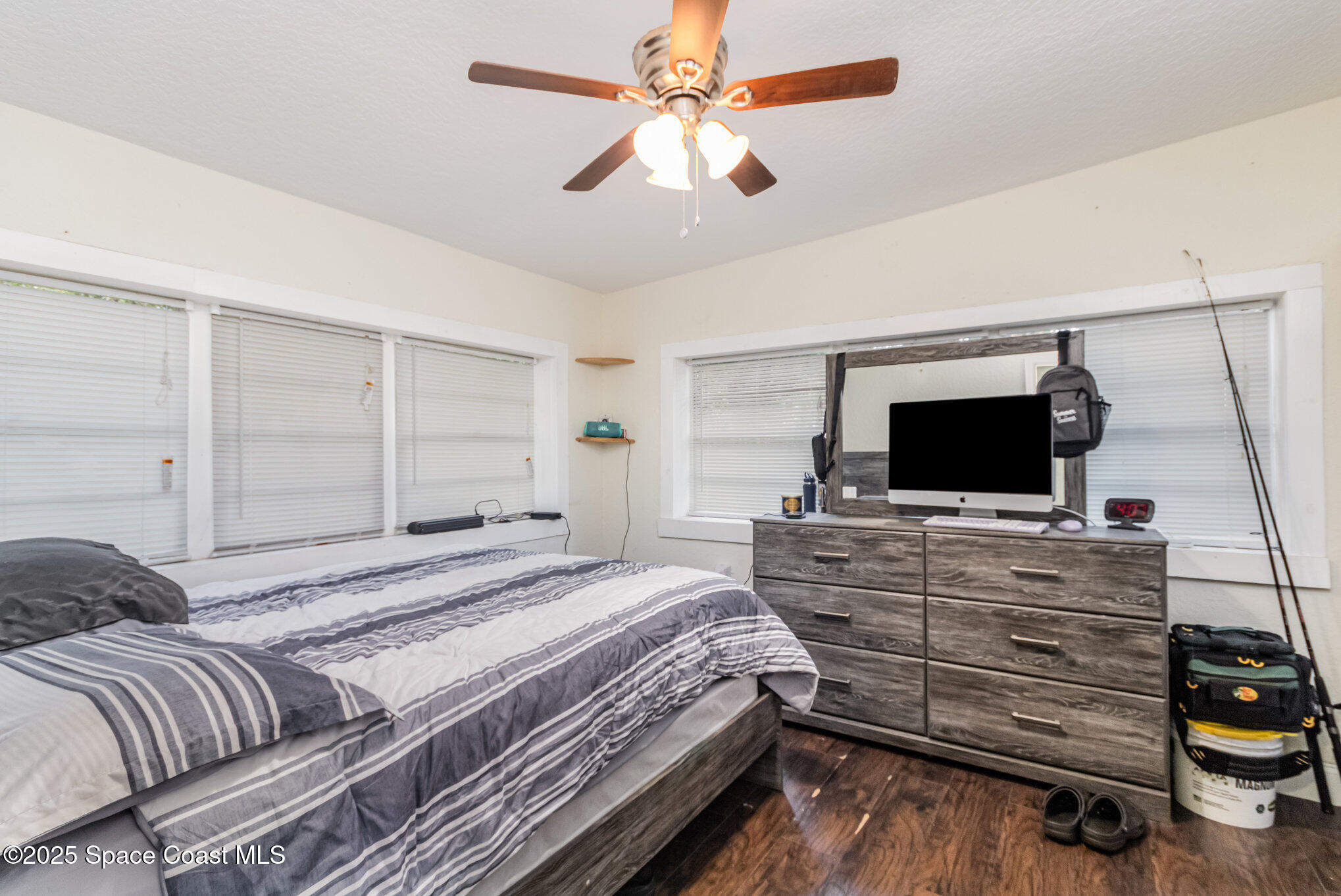 2004 High Street Leesburg, FL 34748 - Photo 21 of 30 a bedroom with a bed and a television