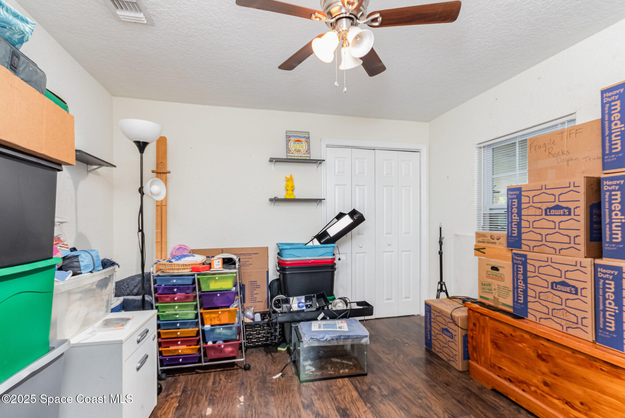 2004 High Street Leesburg, FL 34748 - Photo 24 of 30 a children room with furniture and a wooden floor