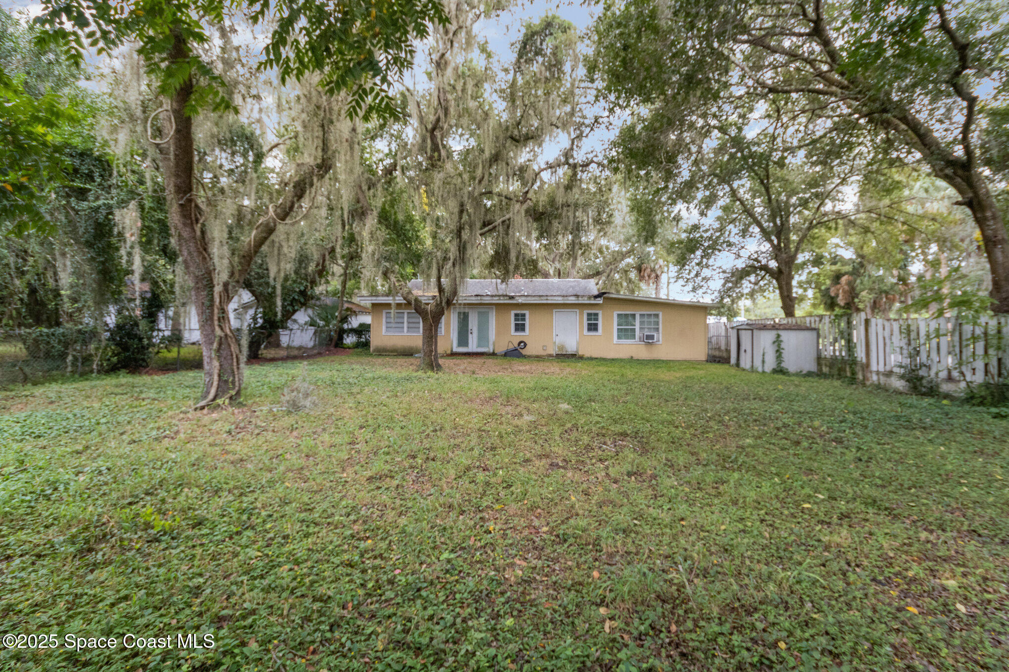 2004 High Street Leesburg, FL 34748 - Photo 30 of 30 a view of a house with a yard
