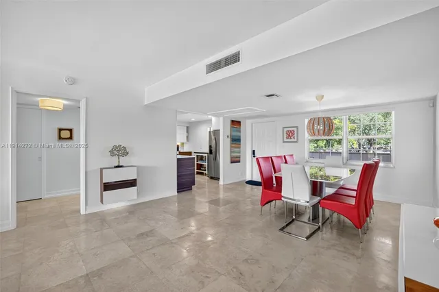 a view of a livingroom with furniture and a living room