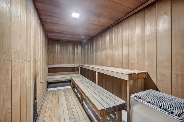 a kitchen with stainless steel appliances a sink and a refrigerator