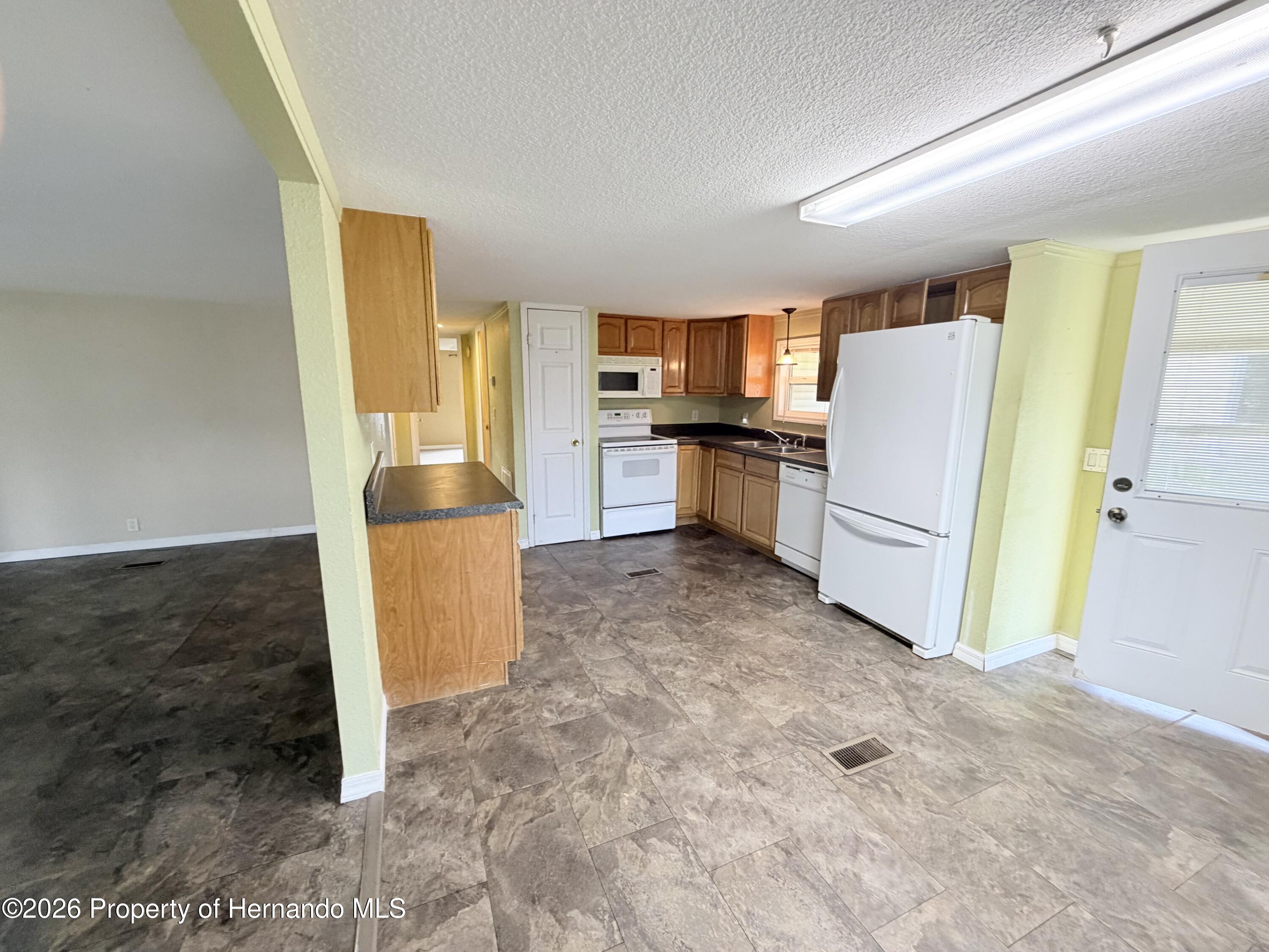 14224 Sandhurst Street Spring Hill, FL 34613 - Photo 5 of 29