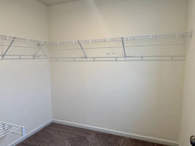 a view of hallway with stairs