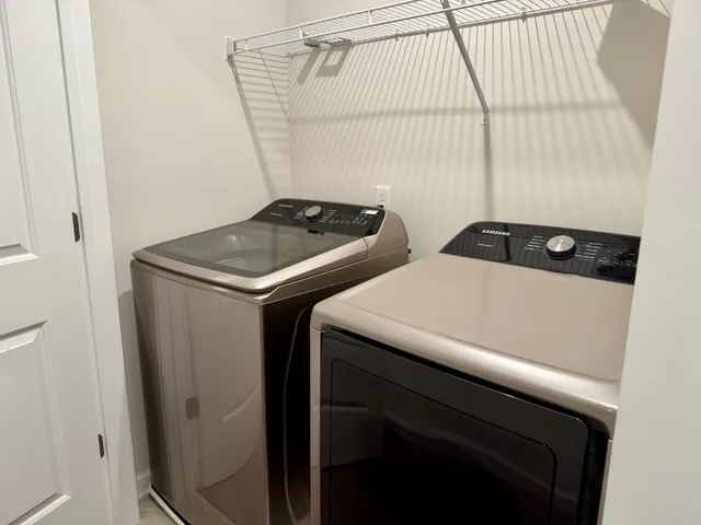 a view of a bathroom from a hallway