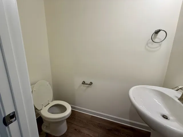 a kitchen with kitchen island a sink appliances and a counter top space