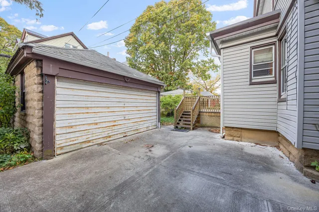 a view of a house with a garage
