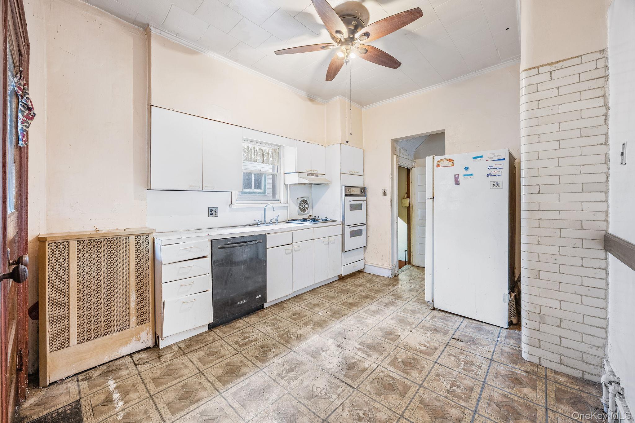 770 Argyle Road Brooklyn, NY 11230 - Photo 10 of 28 a kitchen with a cabinets appliances and a counter top space