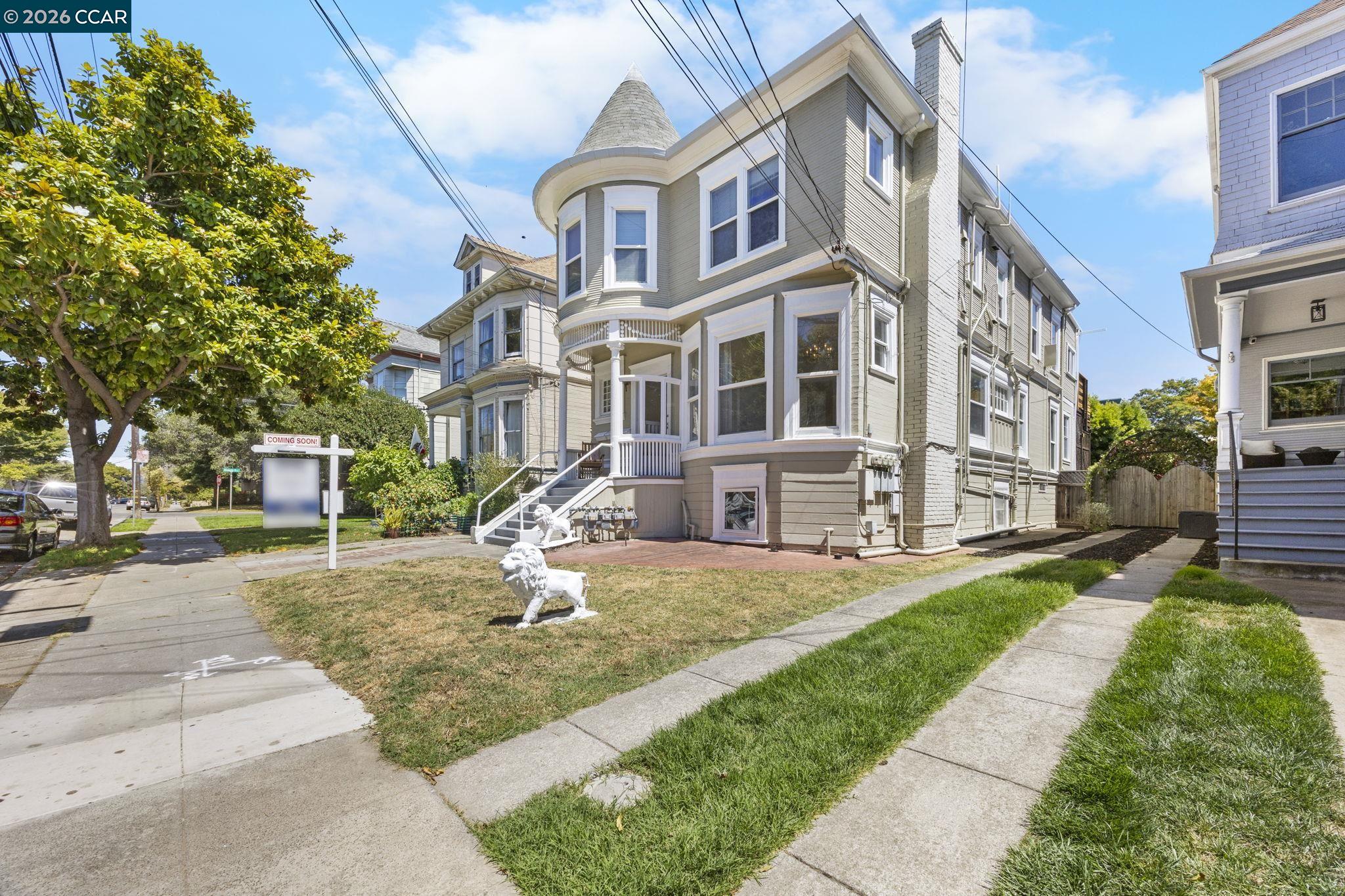 a view of a building with a yard