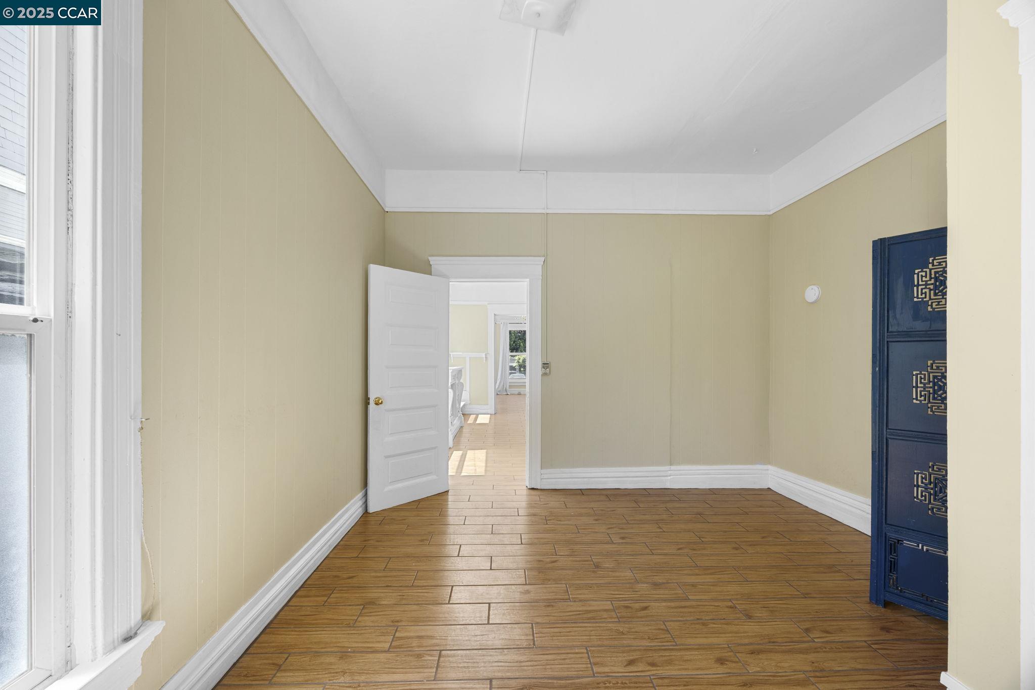 1220 Chestnut Street Alameda, CA 94501 - Photo 15 of 29 a view of an empty room with wooden floor