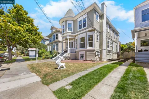 a view of a building with a yard