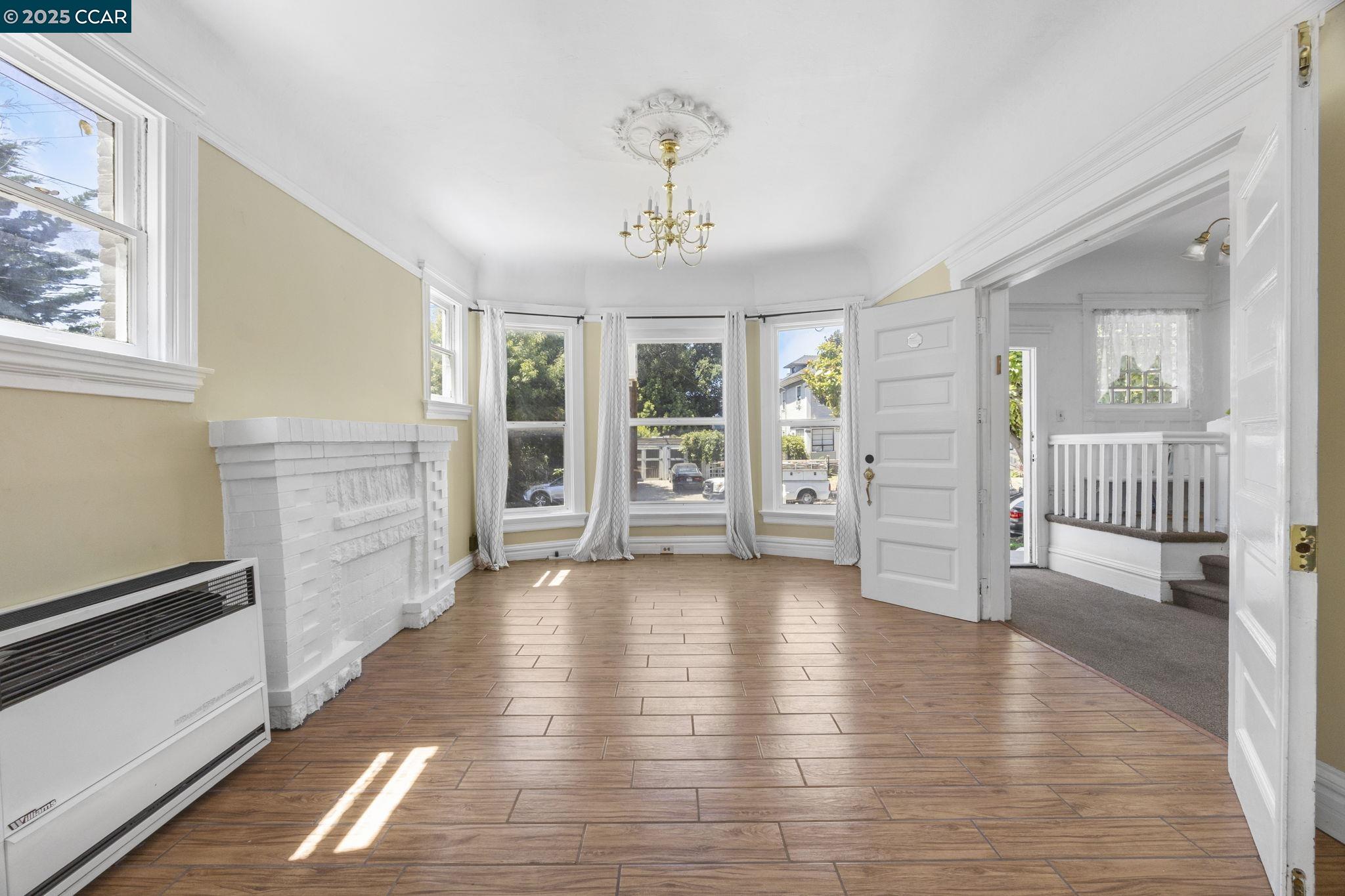 1220 Chestnut Street Alameda, CA 94501 - Photo 8 of 29 wooden floor in an empty room with a window