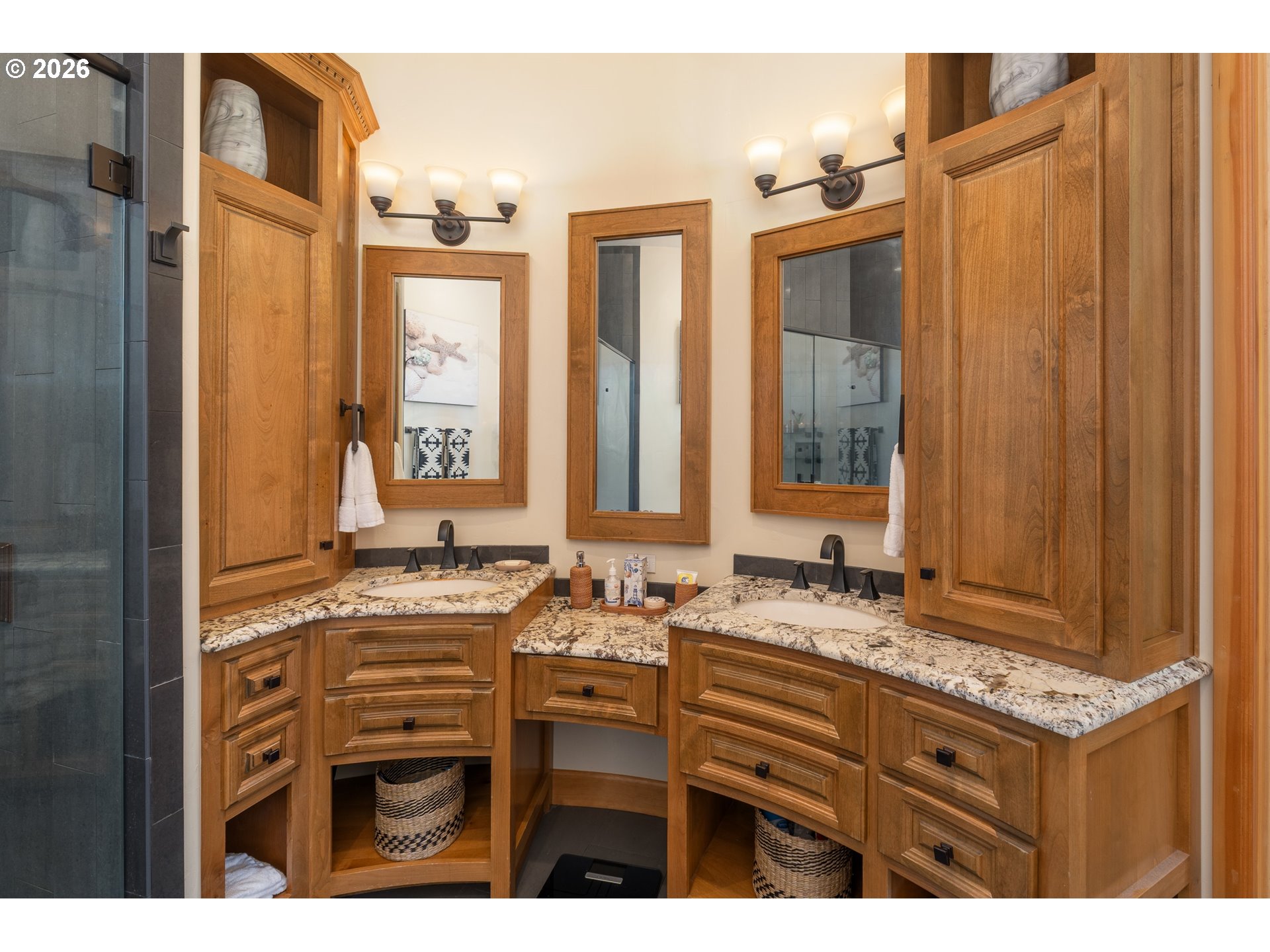 94880 Grizzly Mountain Road Gold Beach, OR 97444 - Photo 28 of 48 a bathroom with a granite countertop sink and a mirror