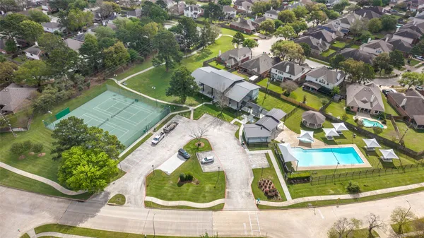 a view of swimming pool with a yard