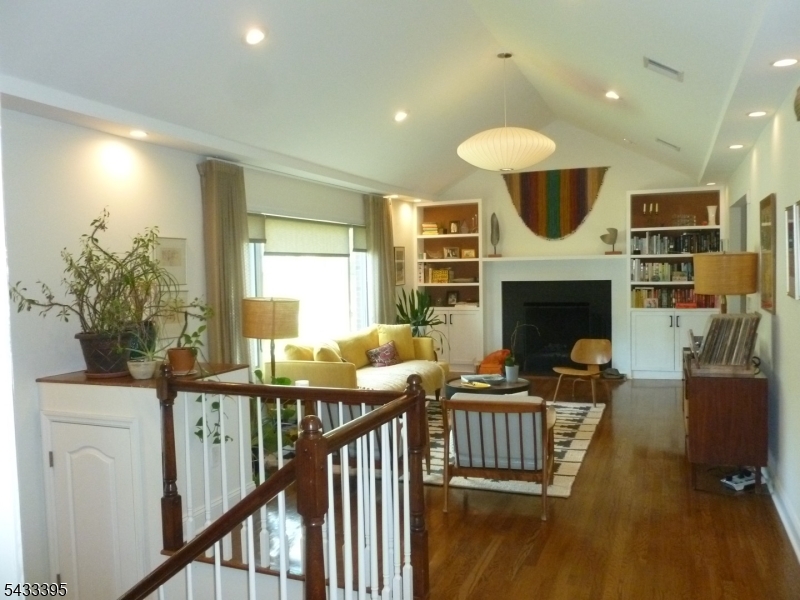 48 Woodmont Road Montclair, NJ 07043 - Photo 3 of 20 a view of a livingroom with furniture a fireplace