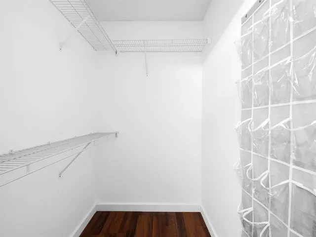 a view of a room with racks on the wall