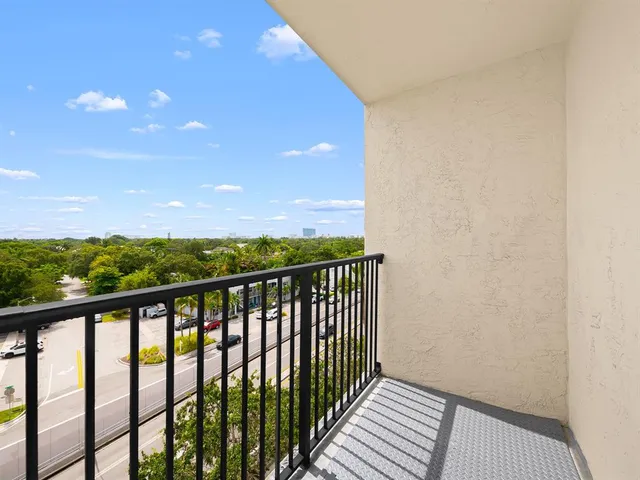 a view of balcony with furniture