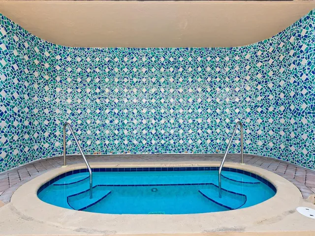 a view of a bathtub in a bathroom