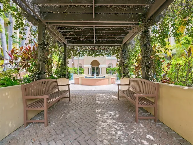 a view of a chairs and table in the patio