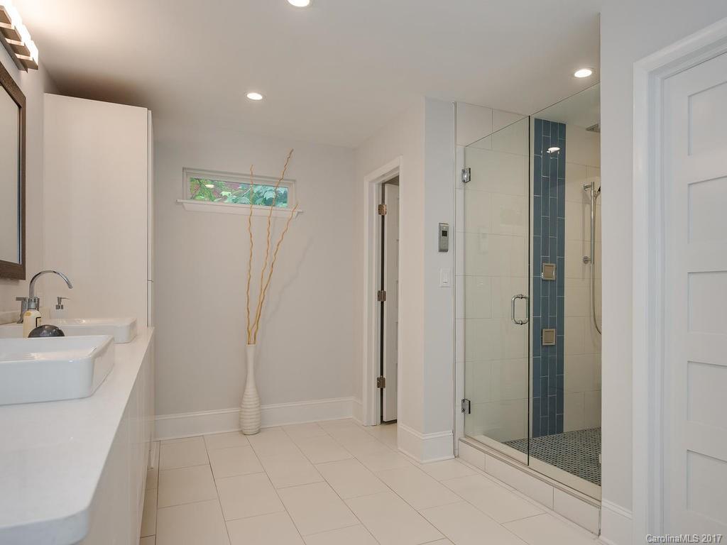 101 Heathwood Road Charlotte, NC 28211 - Photo 13 of 24 a view of an empty room with glass door