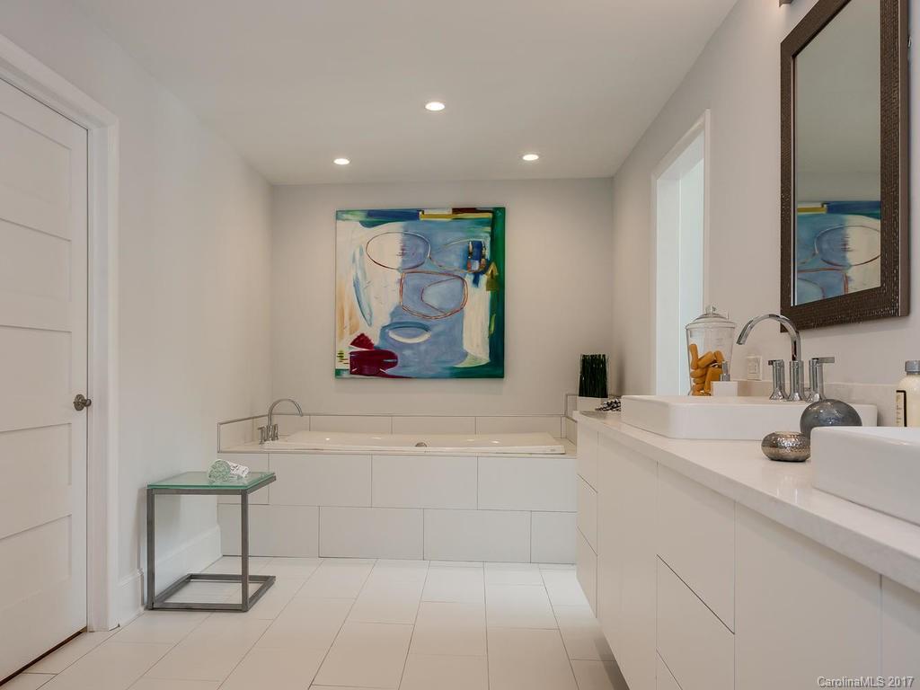 101 Heathwood Road Charlotte, NC 28211 - Photo 14 of 24 a bathroom with a bathtub and a sink
