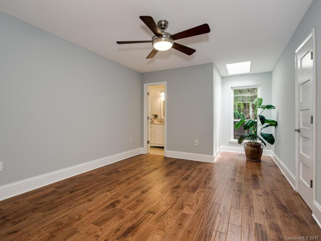 101 Heathwood Road Charlotte, NC 28211 - Photo 16 of 24 a view of an empty room and wooden floor