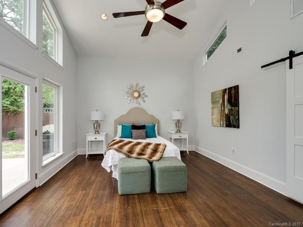 101 Heathwood Road Charlotte, NC 28211 - Photo 10 of 24 a living room with a bed furniture and a window