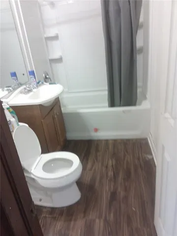 a bathroom with a toilet and a sink
